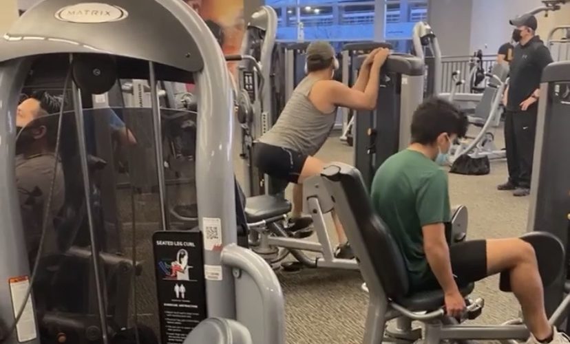 A man twerking workout in a gym