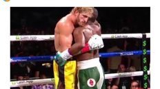 I wish my girl would hold me the way Logan Paul holds Floyd Mayweather meme