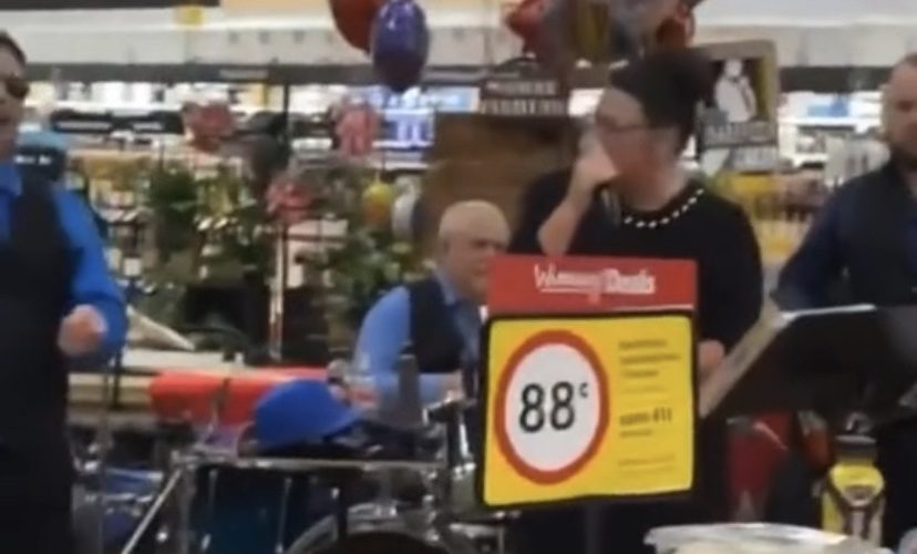 Local band plays wobble for grocery store customers
