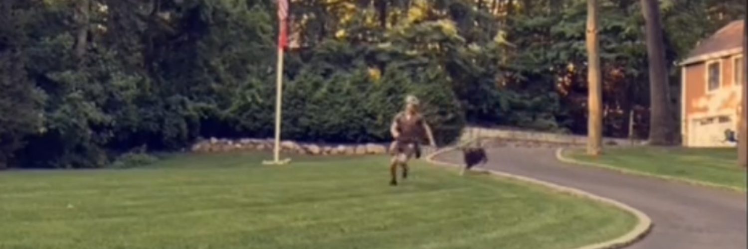 UPS man runs from dog