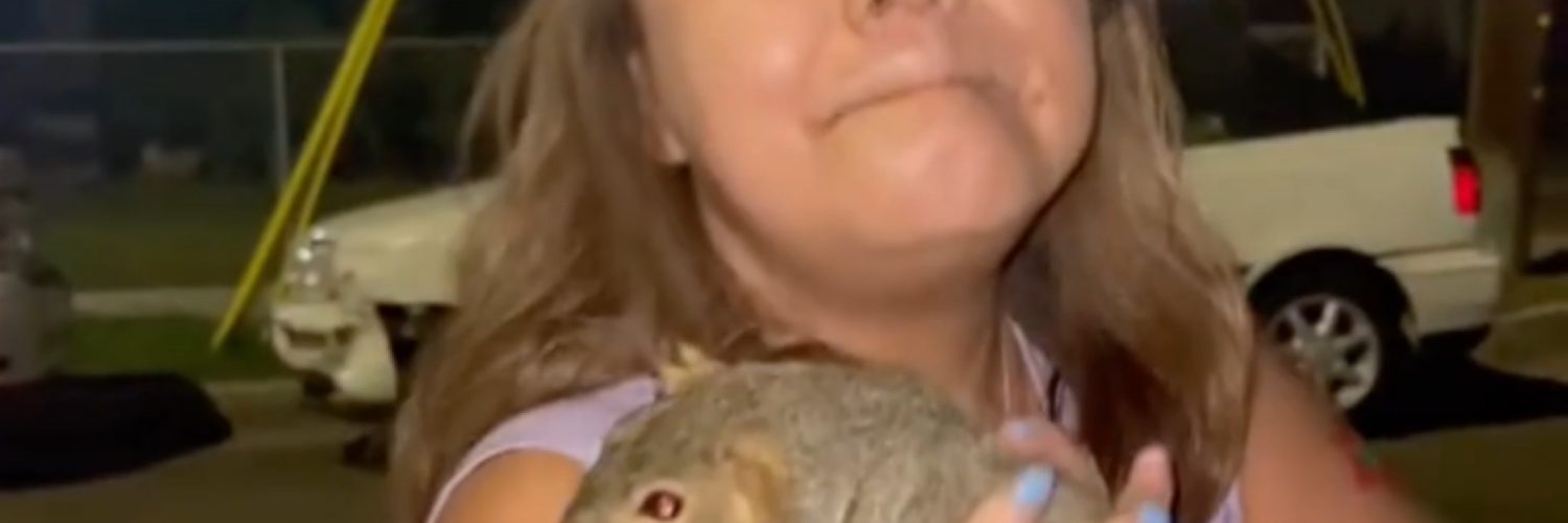 Hispanic mother with pet squirrel
