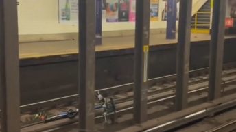 Bike gets thrown on subway tracks