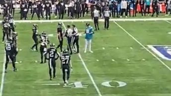 Fan storms field during Jaguar vs Dolphin game