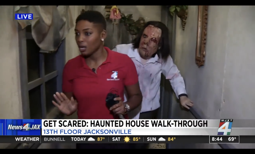News reporter walks through haunted house live