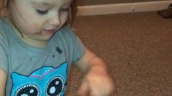 Excited toddler curses while opening presents
