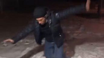 Man slips on ice in driveway