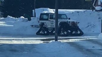 Jeep converted to snowmobile