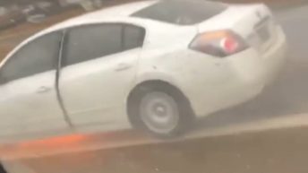 Car catches on fire on highway
