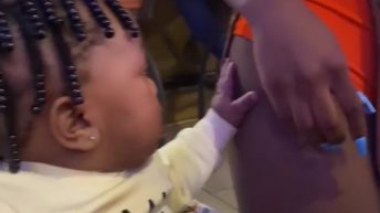Baby falls in love with Hooters server