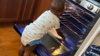 Toddler tries to cook a pizza