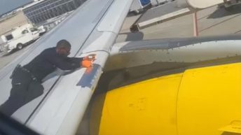 Spirit Airlines worker tapes plane before flight