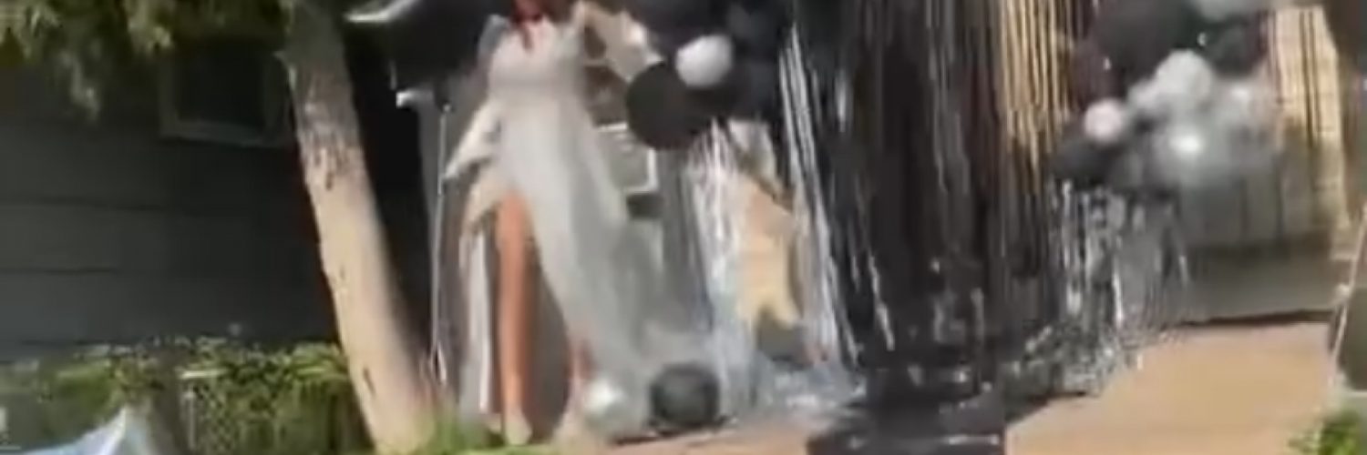 Girl accidentally falls down steps in prom dress
