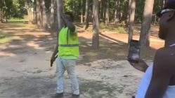 Man hilariously shoots gun in woods